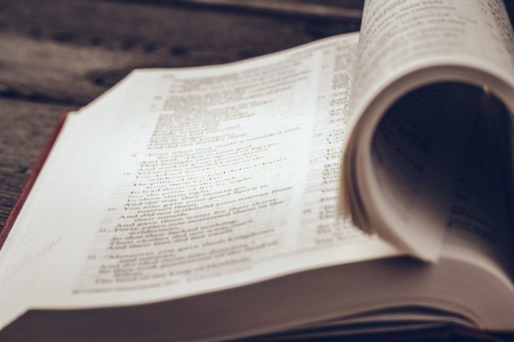 The Holy Bible on a wooden table
